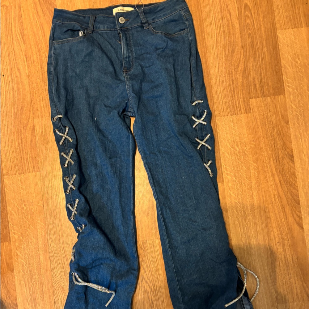 Stretchy rhinestone sparkle threaded side bootcut Jean